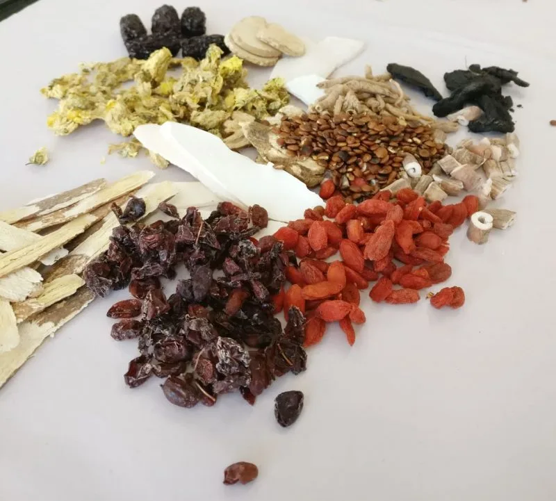 Sorted dried herbs — chrysanthemum, goji, red dates and root slices